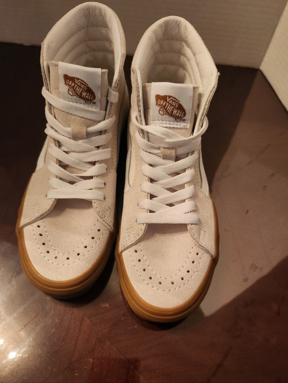Vans Sk8-Hi high-top sneakers in an off-white/cream. Womens 5.0, Mens 3.5.